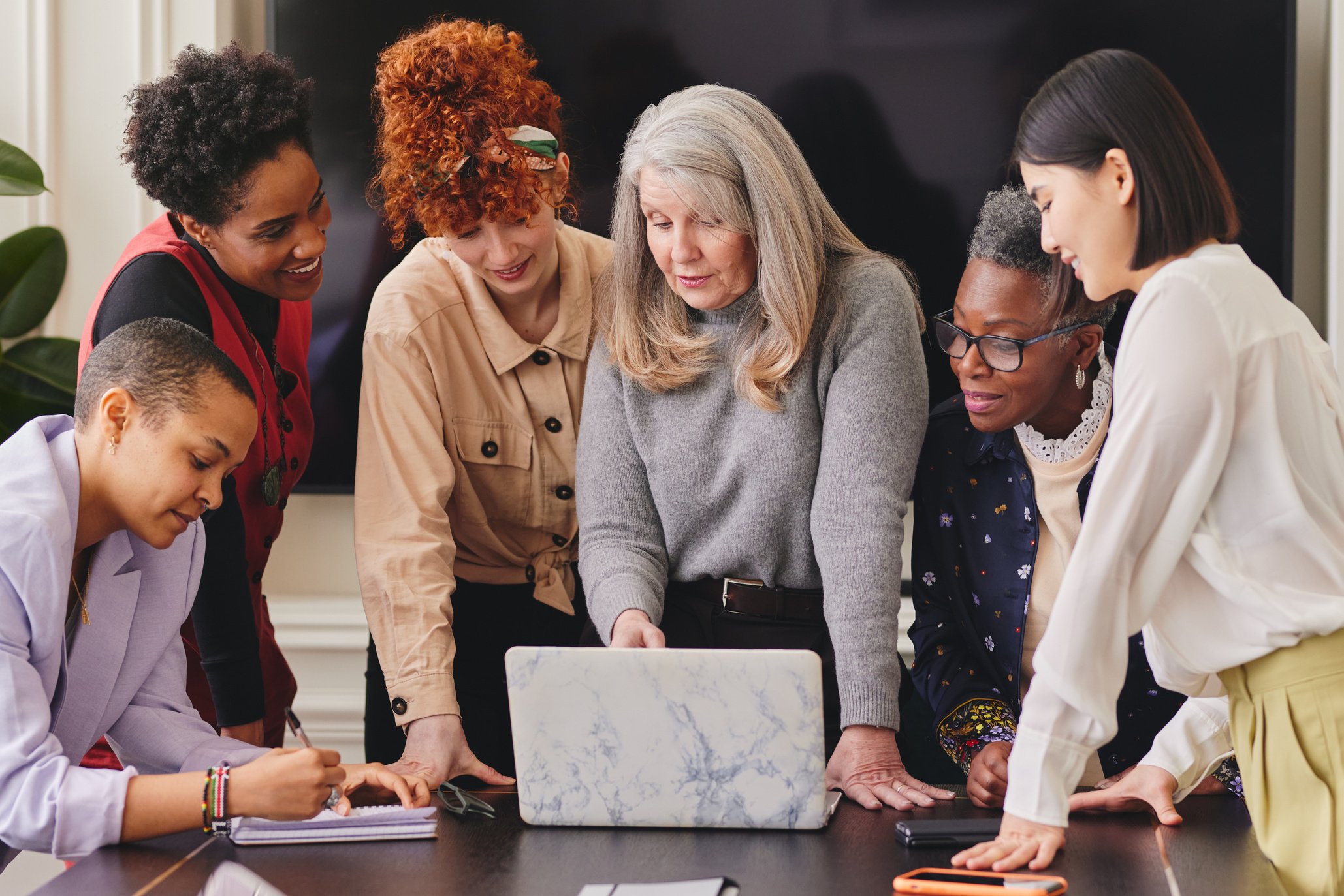 Multi Ethnic Mixed Age Range Women in Creative Business Meeting